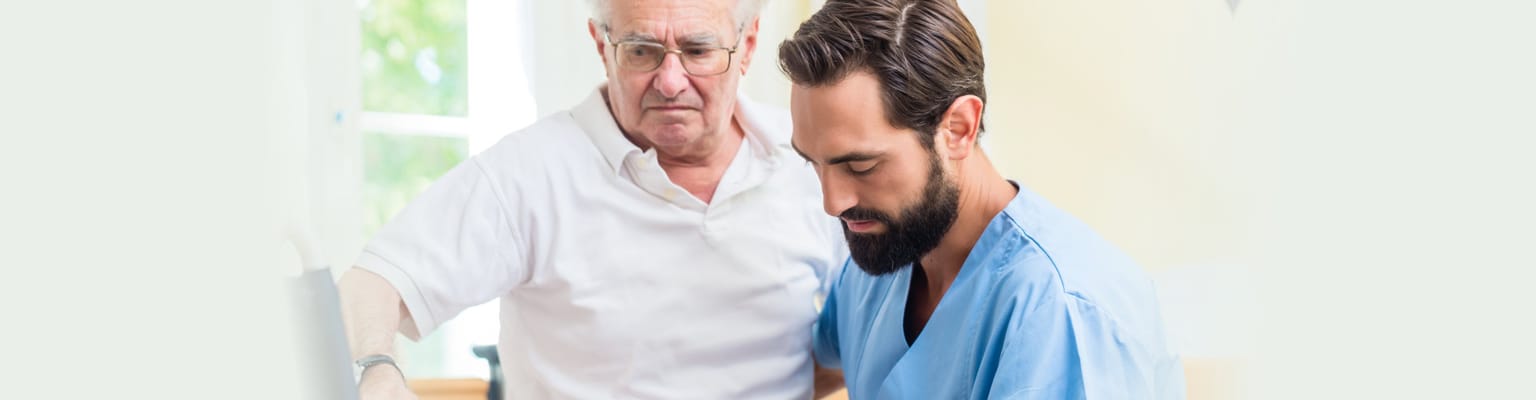 Caregiver assisting an elderly resident