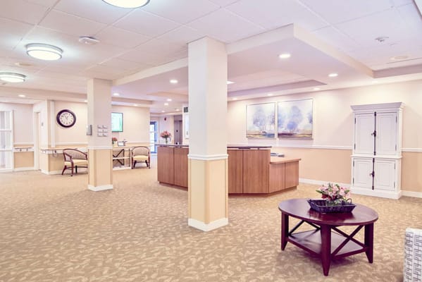 Bright reception area with seating and artwork