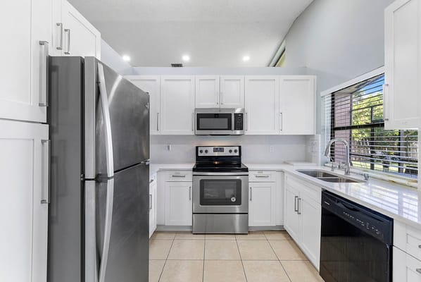 Modern kitchen with stainless steel appliances
