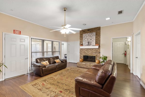 Interior common area with sofas and fireplace