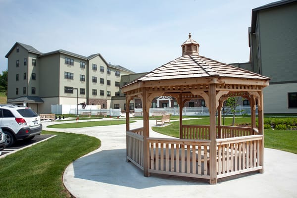 Outdoor gazebo with building in the background