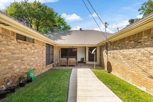 Outdoor area with seating and landscaping