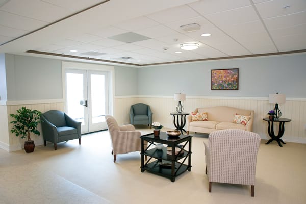 Bright common area with seating and natural light