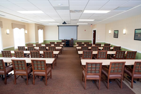 Interior of a multi-purpose activity room with chairs and tables
