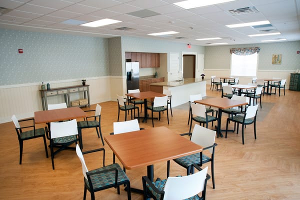 Bright dining room with tables and chairs