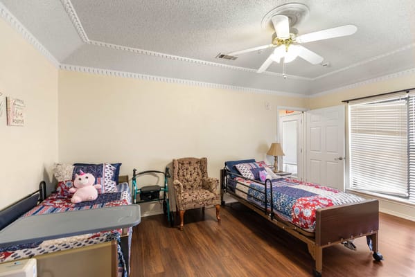 Interior view of a resident room with two beds