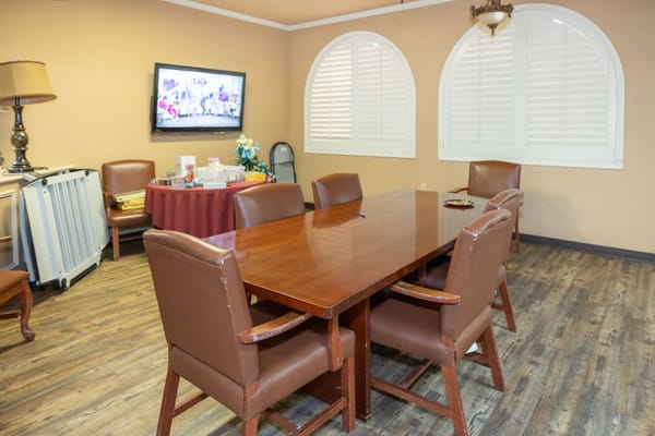 Common area with a dining table and chairs
