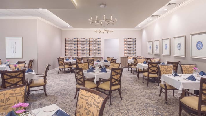 Elegant dining room setup with neatly arranged tables