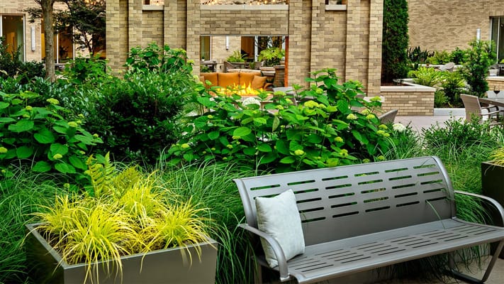 Thoughtfully designed outdoor space with seating and greenery