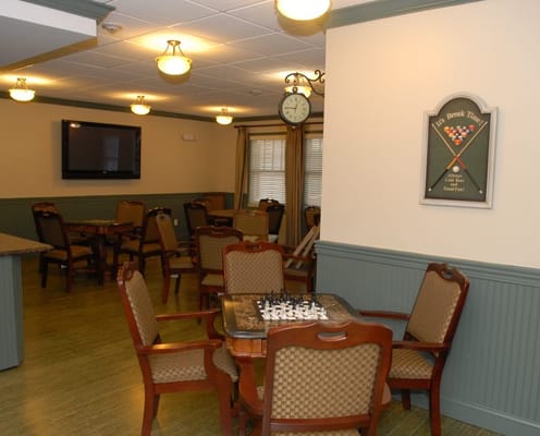 Common area with chess and dining tables