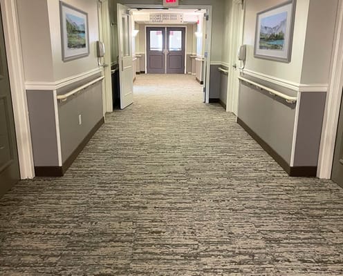 A long hallway in a senior living facility