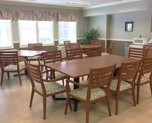 Interior common area with tables and chairs