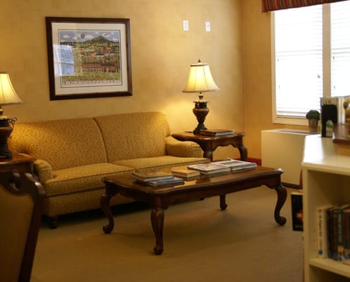 Cozy common area with seating and artwork