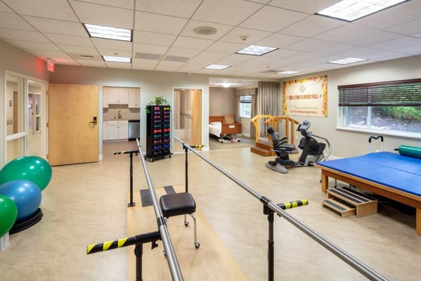 Interior of a rehabilitation exercise room with fitness equipment