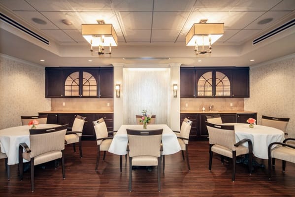 Bright dining room with tables and chairs