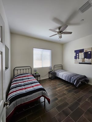 Bright private resident room with two beds