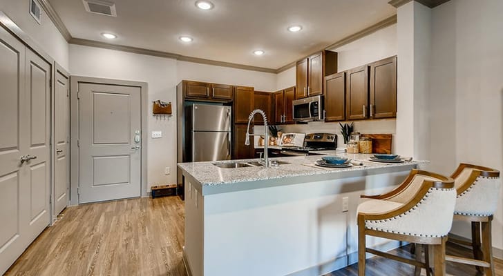 Spacious modern kitchen with stainless steel appliances