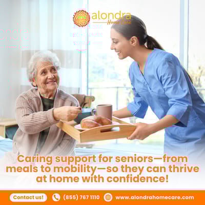 Caregiver serving food to a senior in a bright room