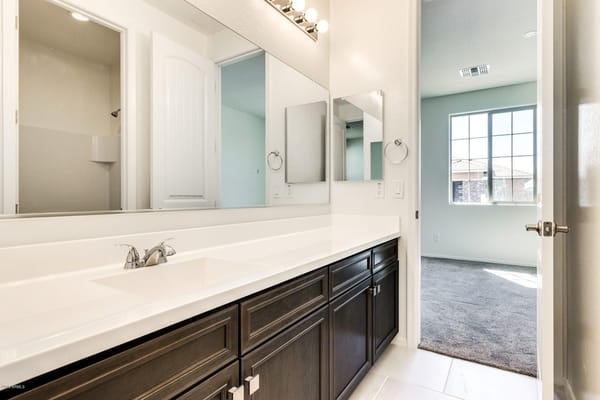 Modern bathroom with double sink and natural light