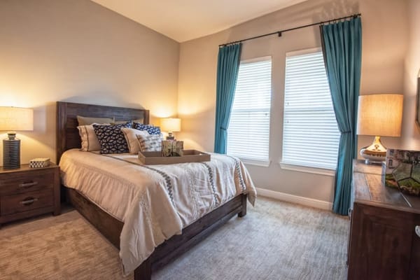 Cozy resident bedroom with natural light