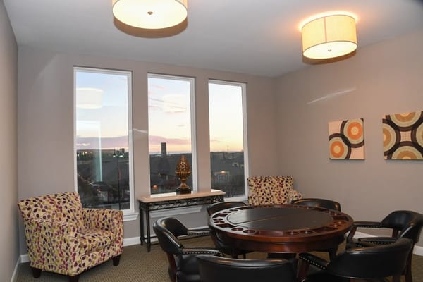 Bright interior common area with seating and decor