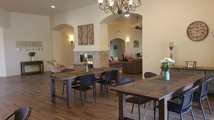 Bright common area with tables and seating