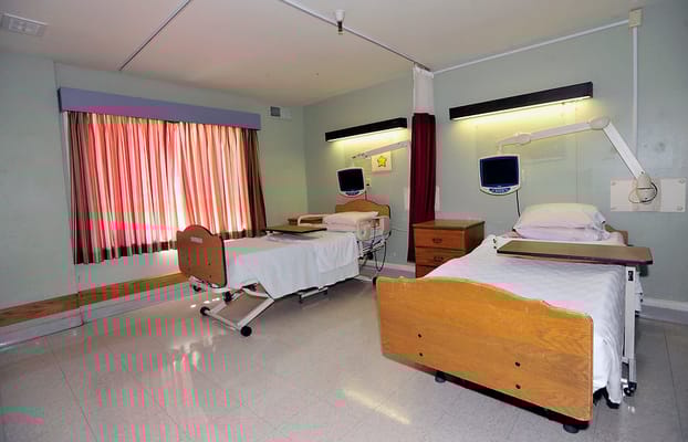 Interior of a shared resident room with two beds