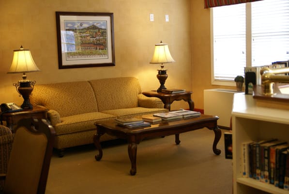 Cozy common area with seating and lamps