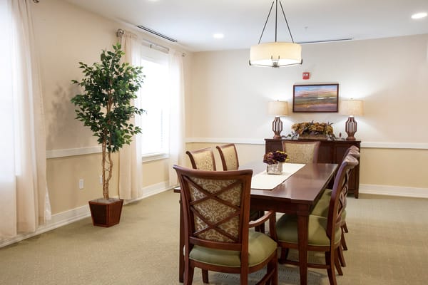 dining area with a table set for residents