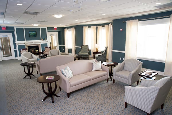 A common area with seating and natural light