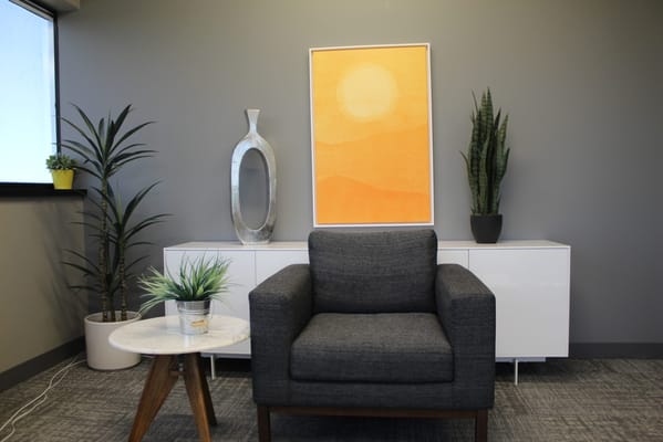 Cozy interior space with chair and plants