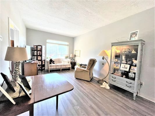 Bright and comfortable living room in a resident's unit
