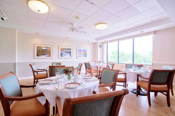 Dining area with tables set for a meal