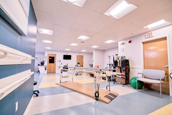 Physical therapy room with equipment and facilities