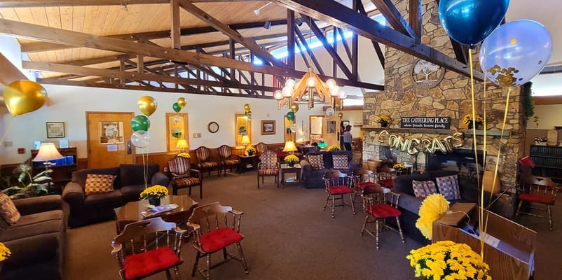 A cozy lounge area decorated for a celebration