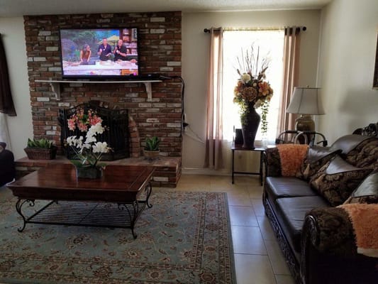 Cozy common area with a fireplace and seating