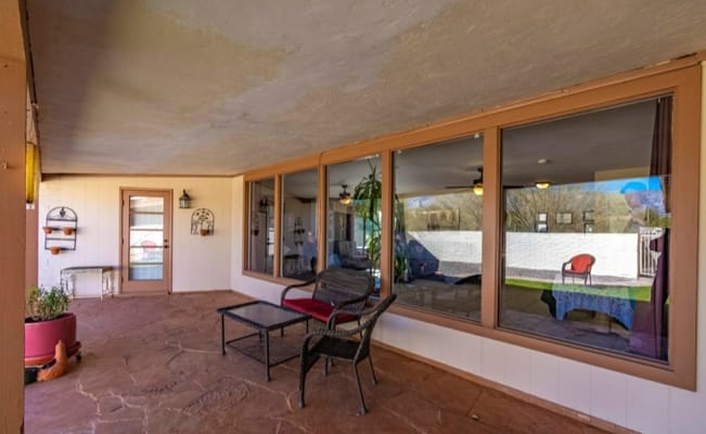 Covered outdoor area with seating and views