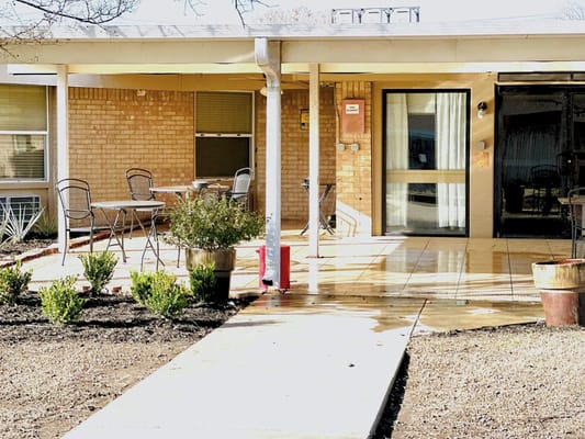 Outdoor seating area in front of the facility