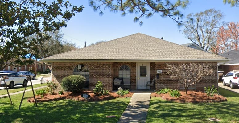 Front exterior of Fidelis Residential Care Home with garden