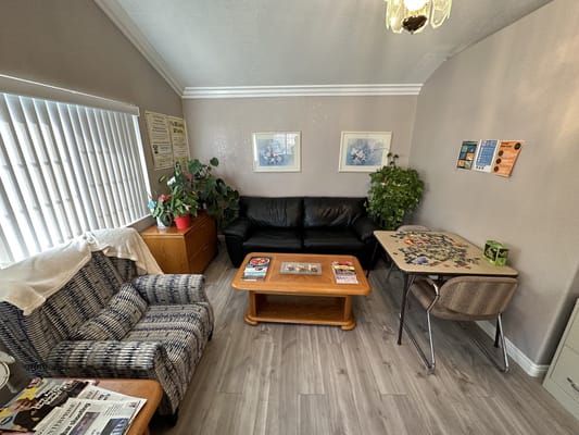 Cozy common area with seating and plants