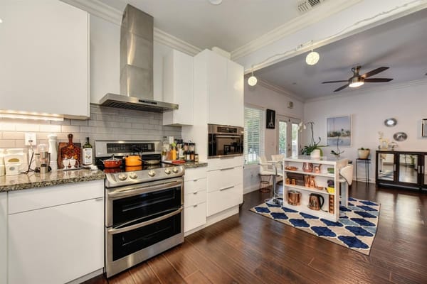 Modern kitchen area with dining space
