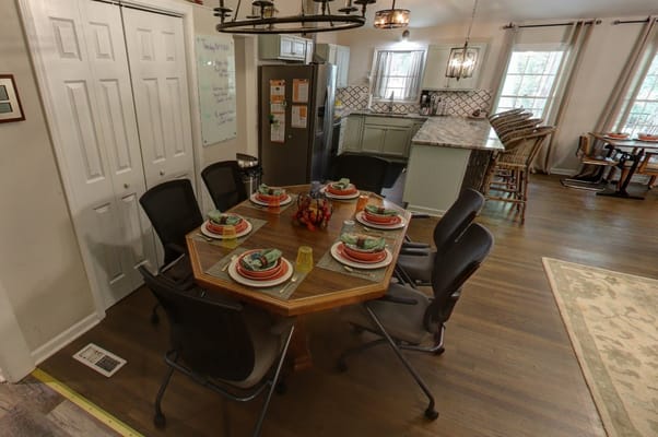 Dining area set with plates and decorations