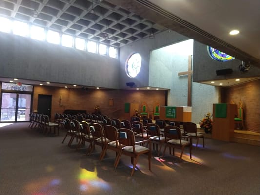 Interior view of a chapel with rows of chairs