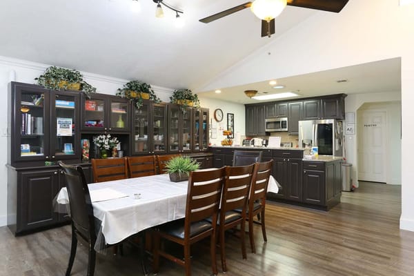 Bright dining area with tables and cabinets