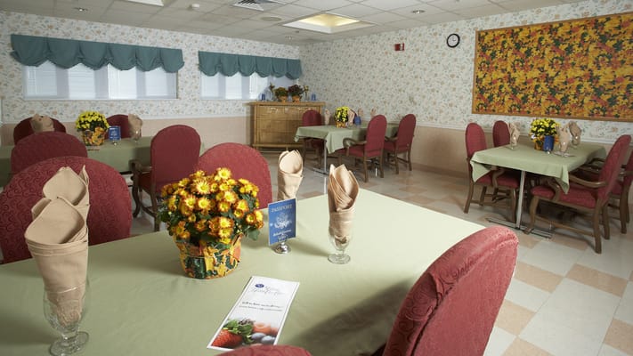 Dining room set up with floral arrangements