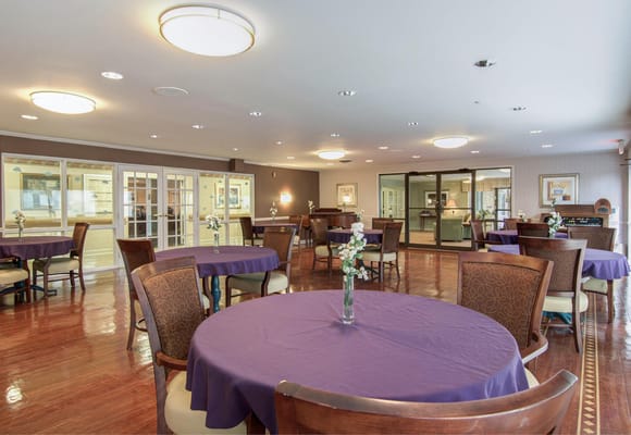 Interior view of a common area with tables and chairs