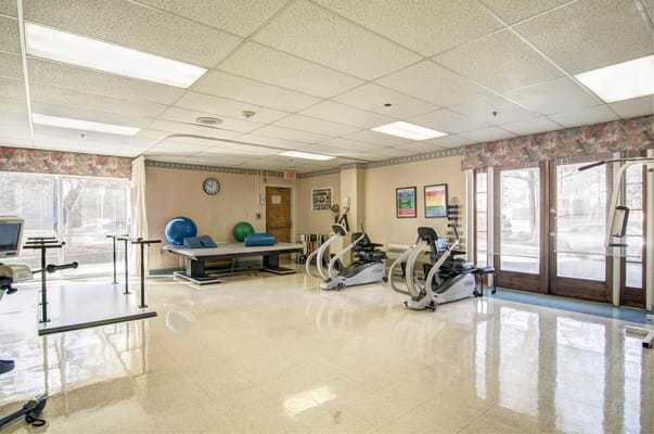 Interior view of a fitness area with exercise equipment