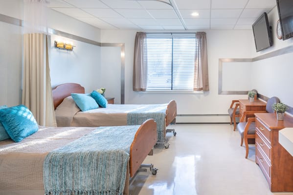 Bright, spacious resident room with two beds