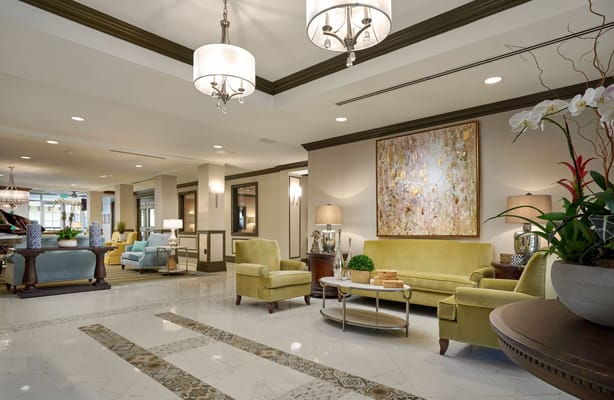 Bright and inviting common area with seating and artwork