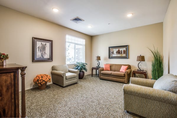 Bright common area with seating and decor